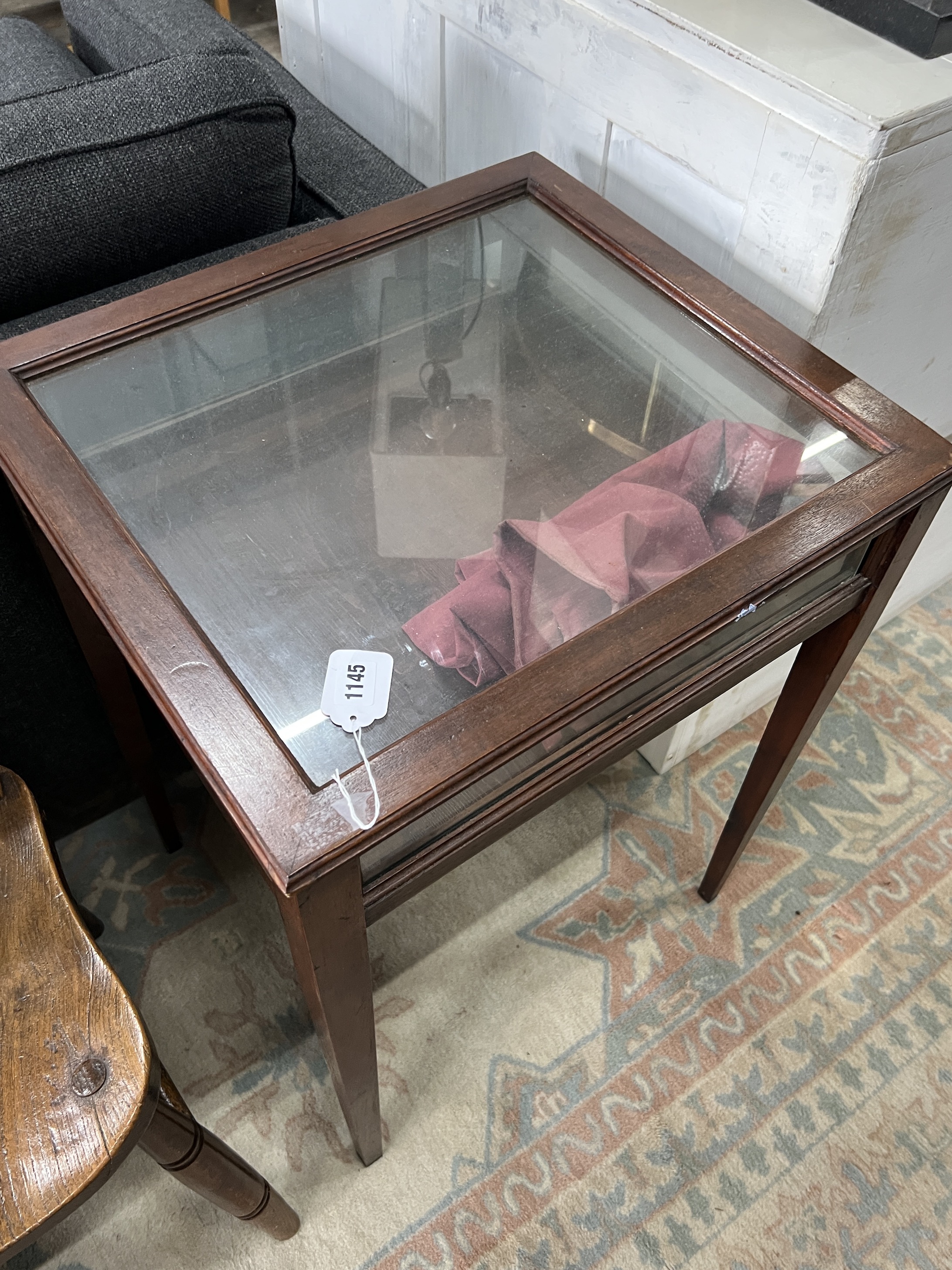 An Edwardian style mahogany bijouterie table, width 54cm, depth 49cm, height 72cm